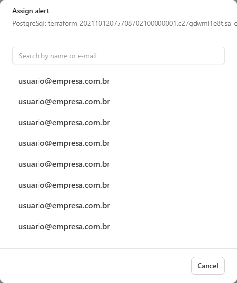 Assign alert modal with the Search by name or e-mail field and the user list