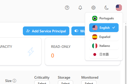Top-of-page actions in the order Help, What's new, Settings, theme and language, with the language selector open